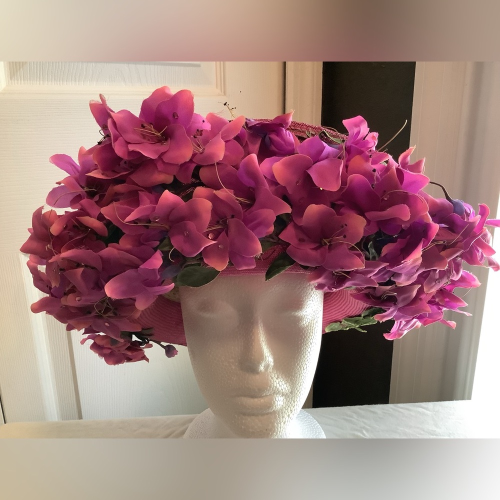 Dark pink “Jack McConnell” flower burst hat.